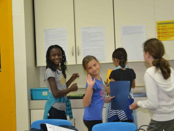 Students in masks working together in a school lab