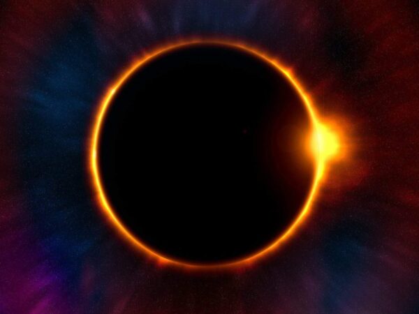 Solar eclipse with a bright ring of light around the dark moon