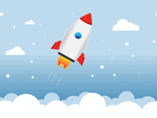 Cartoon rocket launching through a blue sky above the clouds