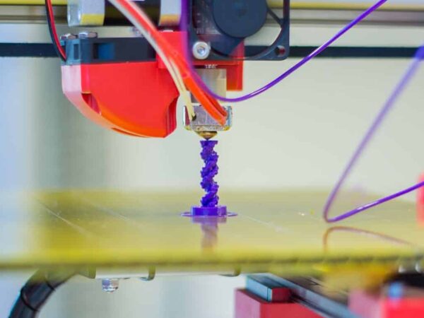 Felix 3D printer printing head | Science Safety 3D printer nozzle printing a small purple object