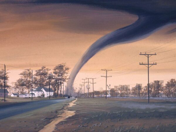 Tornado touching down beside a road with power lines