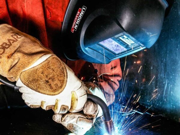 welding | Science Safety Welder in a hand shield and gloves at work