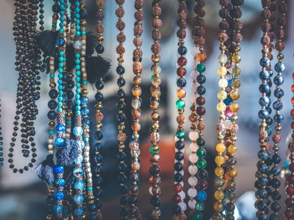 Hanging bead necklaces | Science Safety Strings of coloured beads hanging in rows