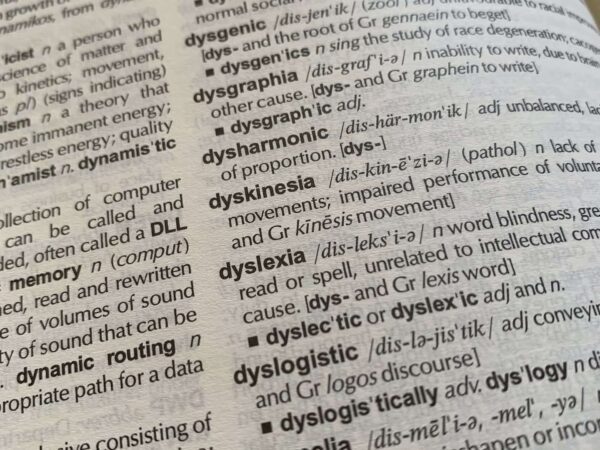 Close-up of a dictionary page showing the entry for dyslexia