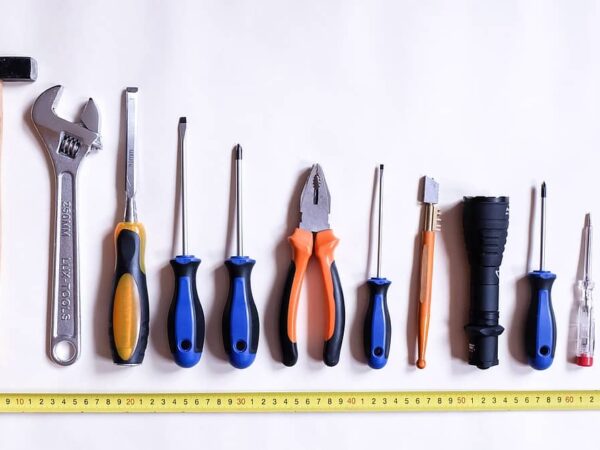 Hand tools and tape measure | Science Safety Row of hand tools beside a tape measure