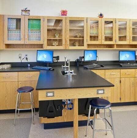 School science lab with benches and cabinets