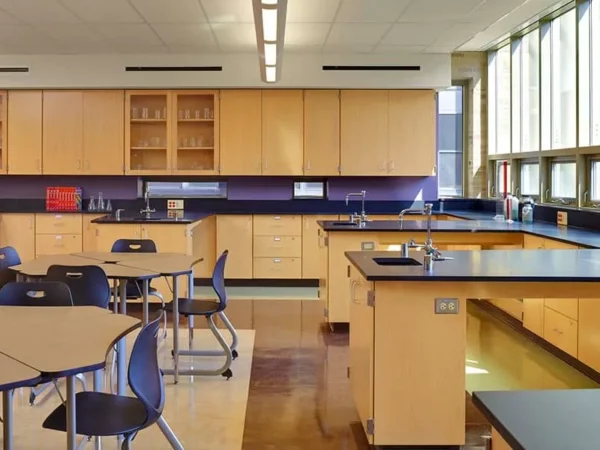 Science classroom with lab benches and cabinets