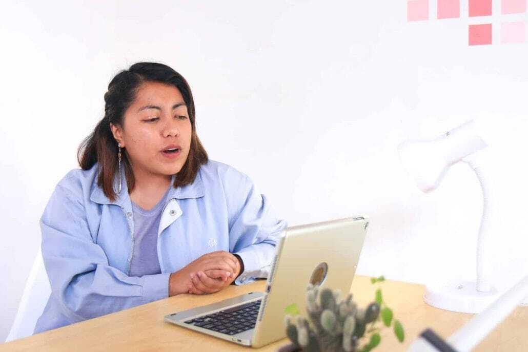 Woman on a video call | Science Safety | Science Safety Woman talking while using a laptop at a desk