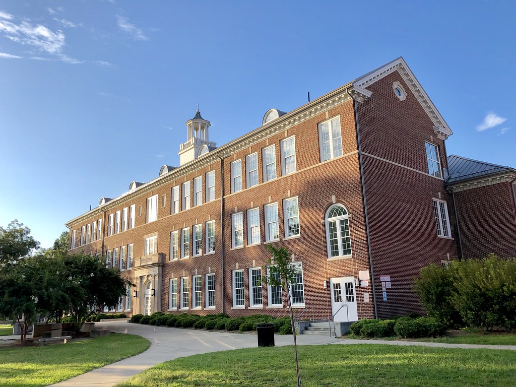 A brick school building on a sunny day