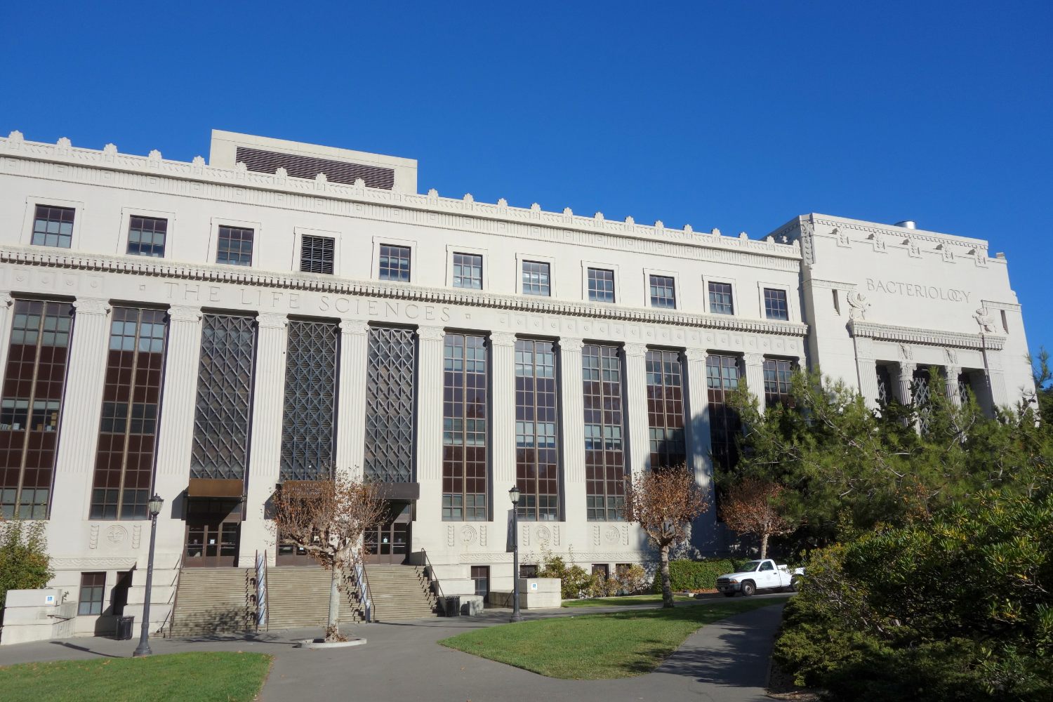 The front of a life sciences building with the words The Life Sciences carved above the entrance